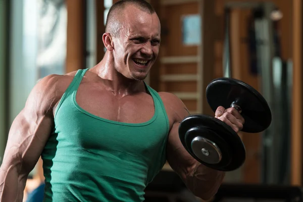 Young Man Doing Exercise For Biceps — Stock Photo, Image