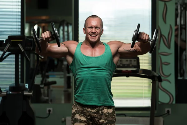 Bodybuilding Shoulder Exercise With Dumbbells — Stock Photo, Image