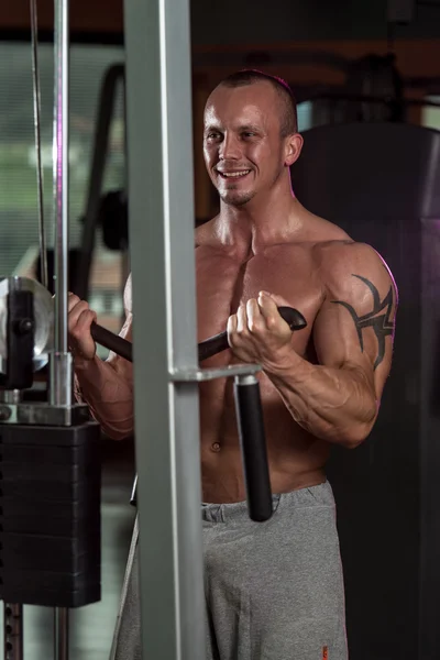 Young Man Exercising Biceps In Healthy Club — Stock Photo, Image