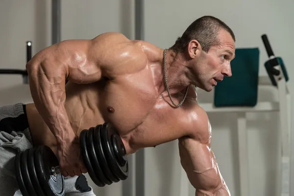 Healthy Man Doing Back Exercises With Dumbbell — Stock Photo, Image