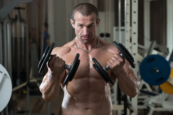 Young Man Doing Exercise For Biceps — Stock Photo, Image