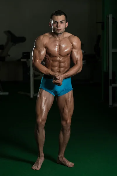 Bodybuilder Performing Most Muscular Poses — Stock Photo, Image