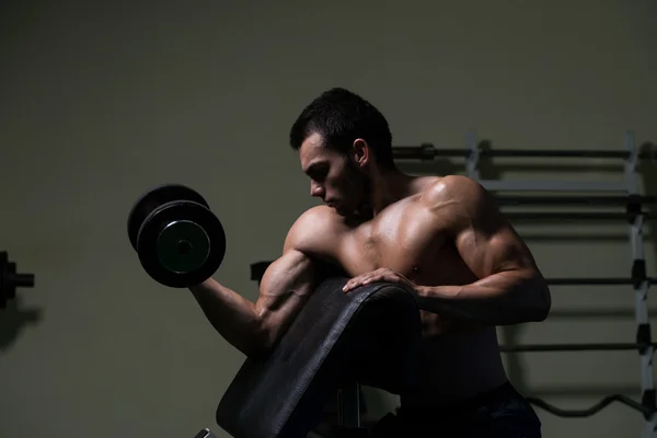 Young Man Doing Exercise For Biceps — Stock Photo, Image