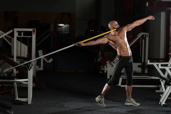 Side view Of Muscular Bodybuilder Throwing Javelin — Stock Photo, Image