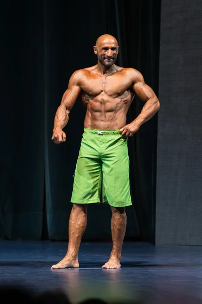 Bodybuilder On A competition For The Win — Stock Photo, Image