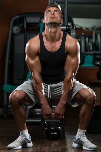 Man And Kettle Bell — Stock Photo, Image