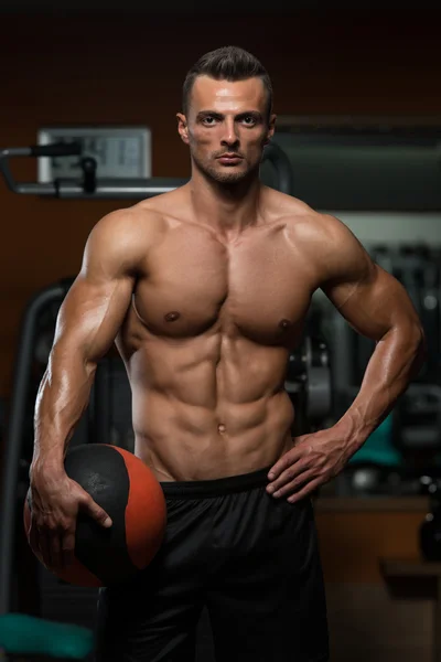 Athletic Man Workout With Medical Ball — Stock Photo, Image