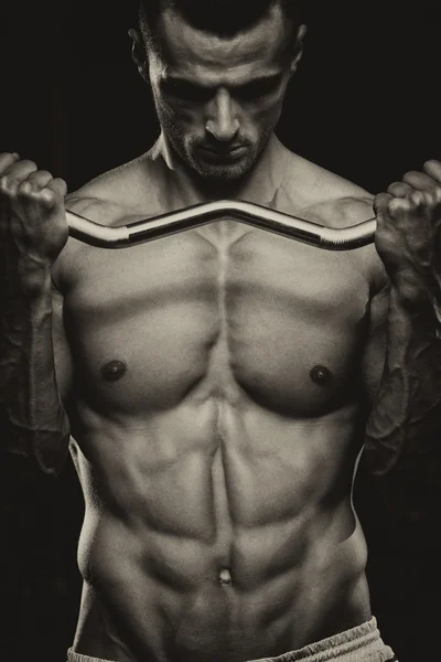 Young Man Working Out In A Health Club — Stock Photo, Image