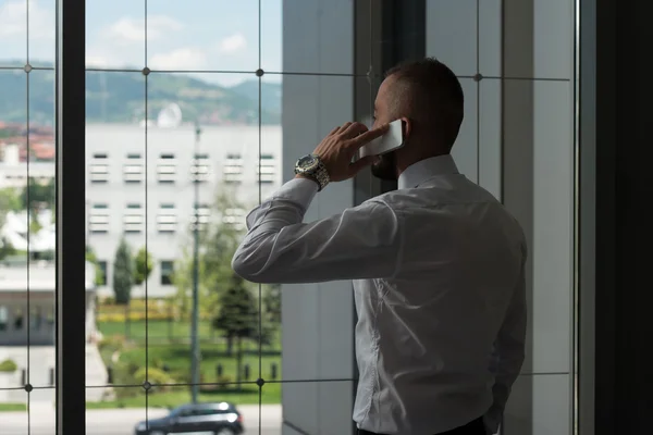 Geschäftsmann am Telefon — Stockfoto