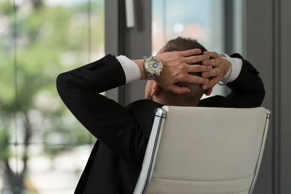 Businessman Relaxing With His Hands Behind His Head — Stock Photo, Image