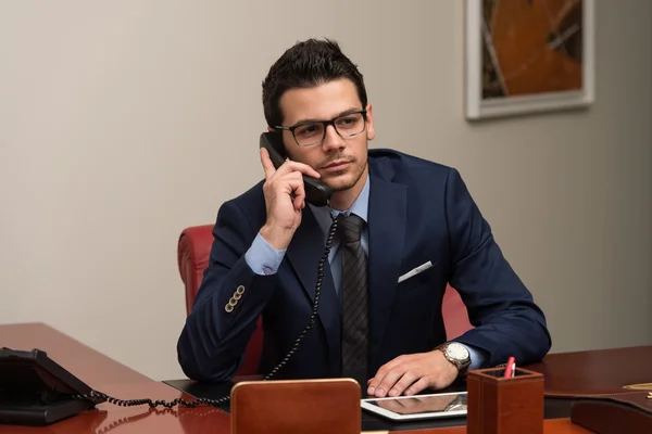 Businessman Talking On Telephone In Office — Stock Photo, Image