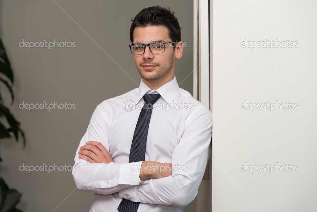 Handsome Young Businessman Portrait In His Office