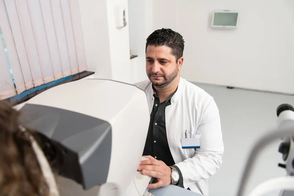 Portrait Handsome Eye Doctor Sitting Ophthalmologic Device Cabinet — Stockfoto