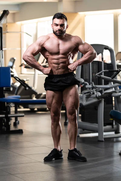 Healthy Young Man Standing Strong Gym Flexing Muscles Muscular Athletic — Stock Photo, Image