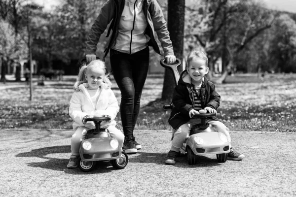 Mom Kids Playing Toy Car Outdoors Park Happy Boy Girl — Stok fotoğraf