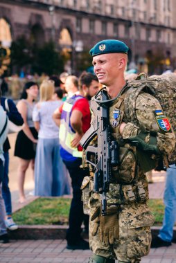 Kyiv, Ukraine - August 20, 2021: Rehearsal of military parade on occasion of 30 years Independence Day of Ukraine. Ukrainian young smiling military man in uniform