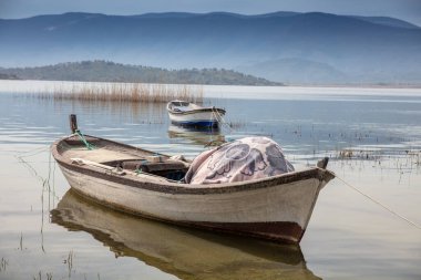 Lake Bafa is a lake and a nature reserve situated in southwestern. At the innermost north-east tip of the lake is the village of Kapikiri, as well as the ruins of Heraclea by Latmus.