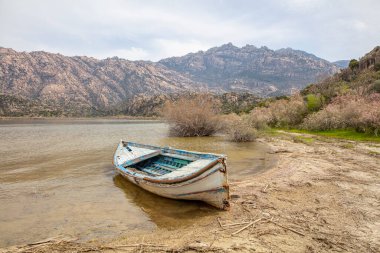 Lake Bafa is a lake and a nature reserve situated in southwestern. At the innermost north-east tip of the lake is the village of Kapikiri, as well as the ruins of Heraclea by Latmus.