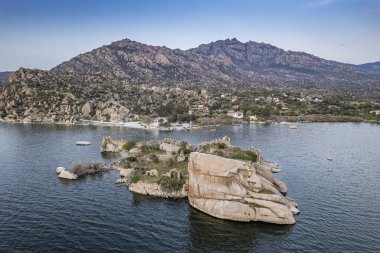 Lake Bafa is a lake and a nature reserve situated in southwestern. At the innermost north-east tip of the lake is the village of Kapikiri, as well as the ruins of Heraclea by Latmus.
