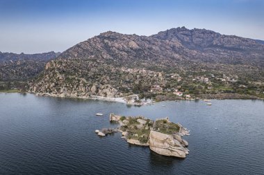 Lake Bafa is a lake and a nature reserve situated in southwestern. At the innermost north-east tip of the lake is the village of Kapikiri, as well as the ruins of Heraclea by Latmus.