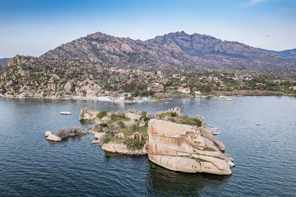Lake Bafa is a lake and a nature reserve situated in southwestern. At the innermost north-east tip of the lake is the village of Kapikiri, as well as the ruins of Heraclea by Latmus.