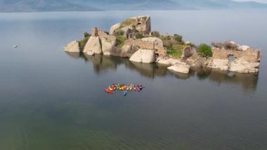 Lake Bafa is a lake and a nature reserve situated in southwestern. At the innermost north-east tip of the lake is the village of Kapikiri, as well as the ruins of Heraclea by Latmus.