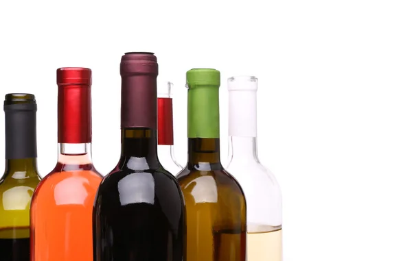 Um conjunto de muitas garrafas de vinho — Fotografia de Stock