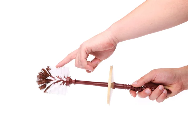 Brown toilet brush isolated in hand. — Stock Photo, Image