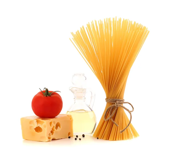 Bunch of spaghetti pasta, fresh tomatoes, cheese — Stock Photo, Image