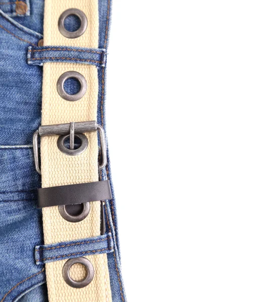 Голубые джинсы и кожаный пояс — стоковое фото