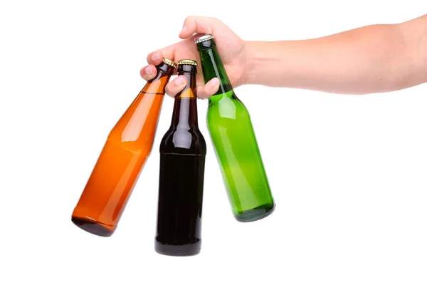 Man's hand holding three beer bottle — Stock Photo, Image