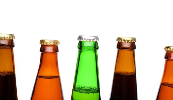 A row of top beer bottlenecks — Stock Photo, Image