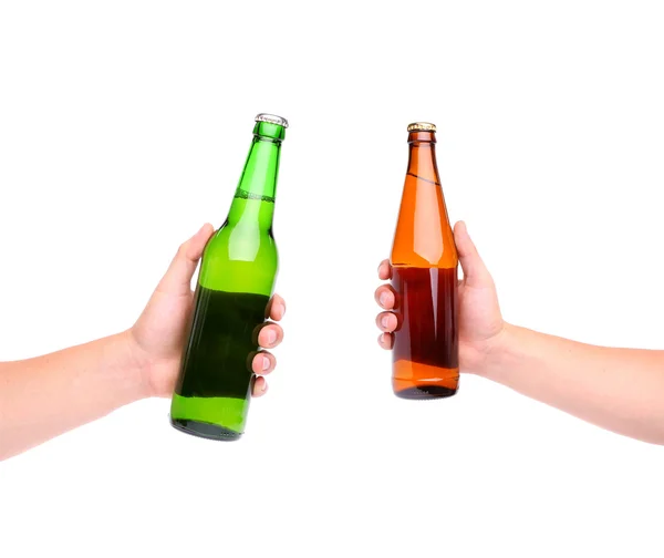 Two beer bottles and hands — Stock Photo, Image