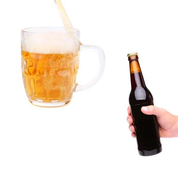 Hand, stream, glass and bottle of beer — Stock Photo, Image