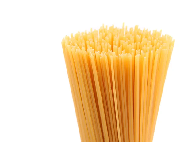Closeup top bunch spaghetti on white — Stock Photo, Image