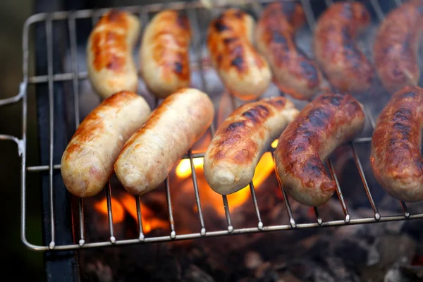 Sausages on grill — Stock Photo, Image