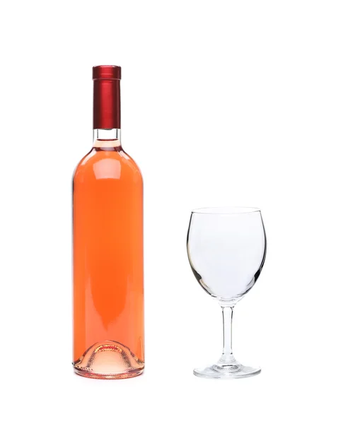 Garrafa de vinho rosa completa e cálice de vidro — Fotografia de Stock