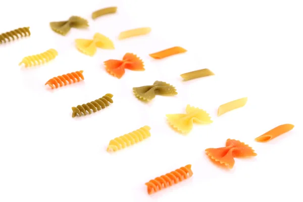 Crossover från olika färg pasta — Stockfoto