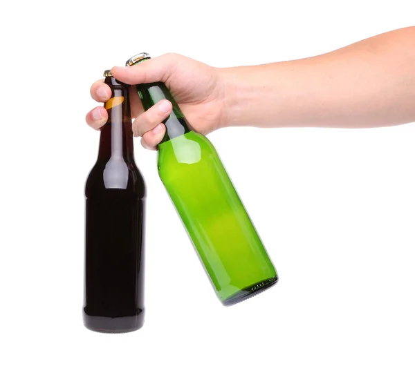 Mano con dos botellas de cerveza sobre fondo blanco — Foto de Stock