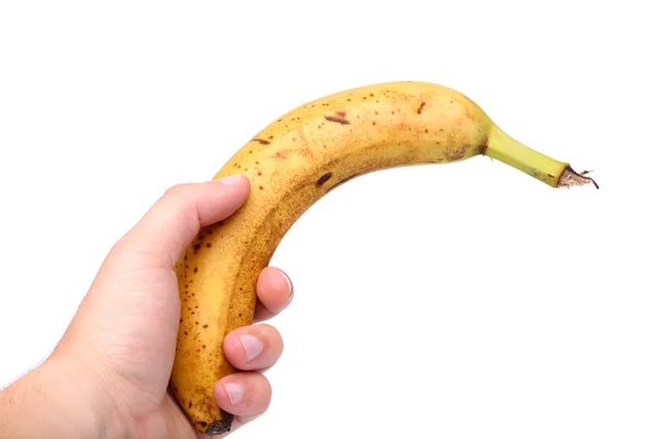 Junge Hand und alte Banane — Stockfoto