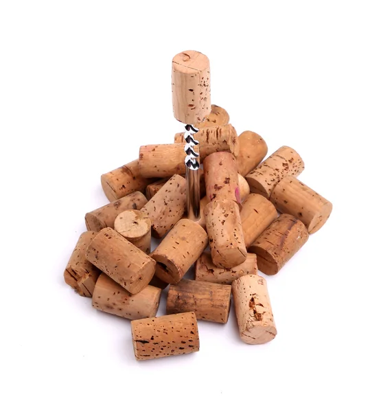 Corkscrew and wine corks close-up — Stock Photo, Image