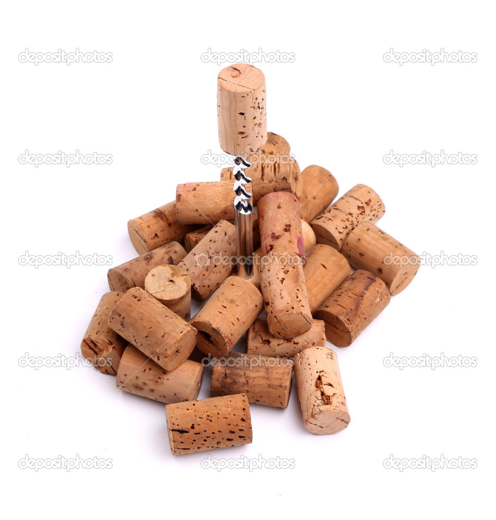 Corkscrew and wine corks close-up