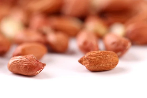 Dedikerad jordnötter mot allmänna bakgrund — Stockfoto