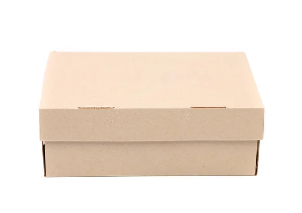 Коробка для обуви расположена на белом фоне — стоковое фото