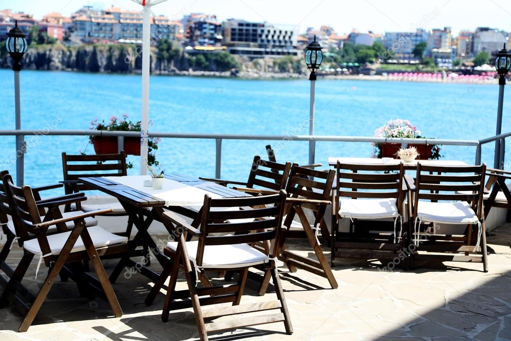 restaurant on bay with views of the city