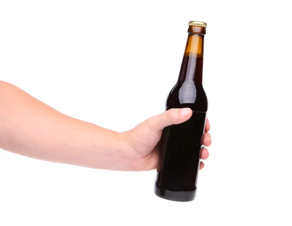 Beer bottle in the hand isolated on white — Stock Photo, Image