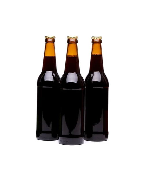 Tres botellas de cerveza. Aislado sobre fondo blanco —  Fotos de Stock