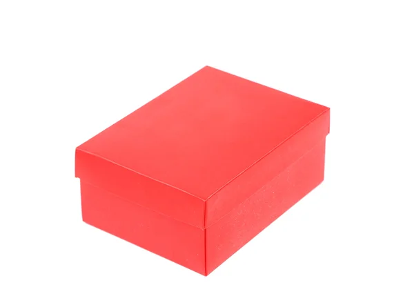 Червона коробка взуття ізольована на білому тлі — стокове фото
