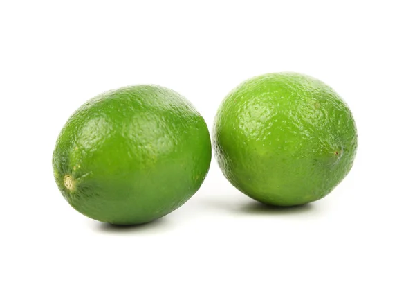 Fresh limes Isolated on a white background — Stock Photo, Image