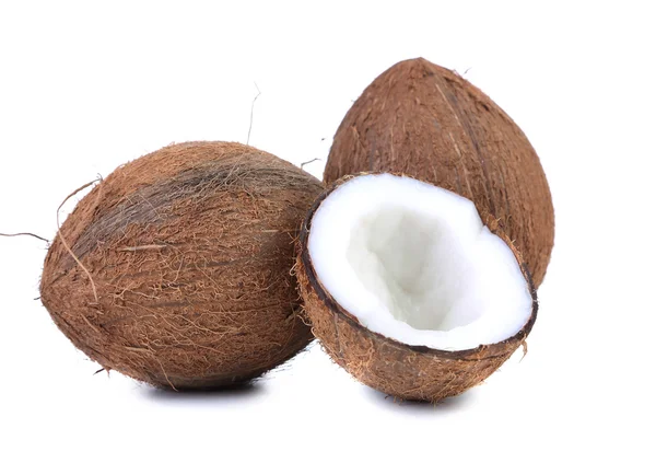 Coconuts and slice on a white background — Stock Photo, Image